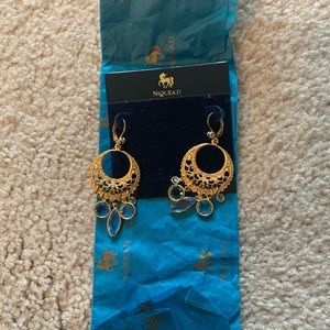 New in box Niquead earrings